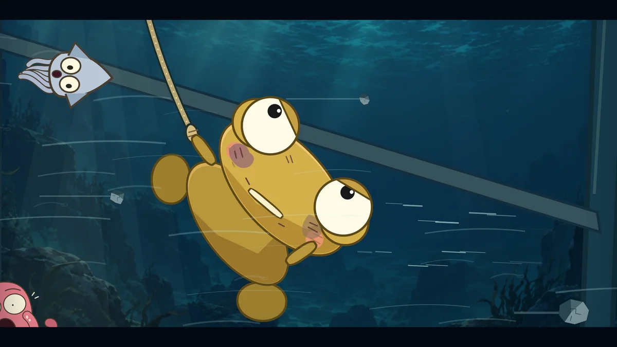 Kero clings to the rope as a startled squid and octopus are swept past.
