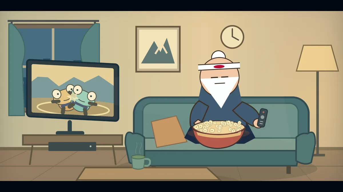 Sensei sits on his couch with a bowl of popcorn, watching TV.