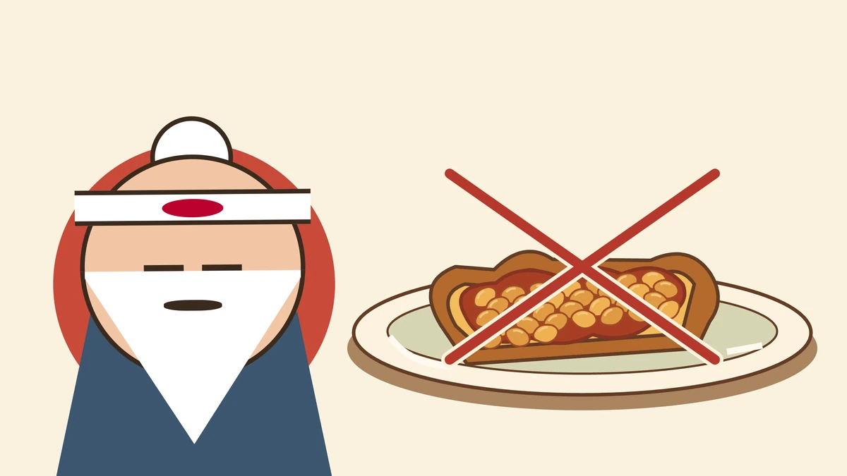 Sensei stands beside a plate of beans on toast with a big red cross over it.