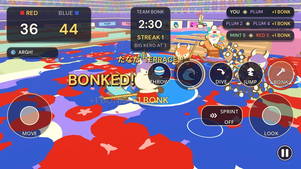 TEAM BONK at Kero Stadium, red against blue, with red and blue ink splashed all over the floor and BONKED! on the screen.